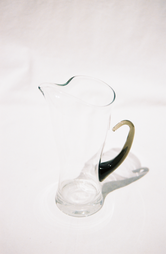 artisanal jug with smoked glass handle