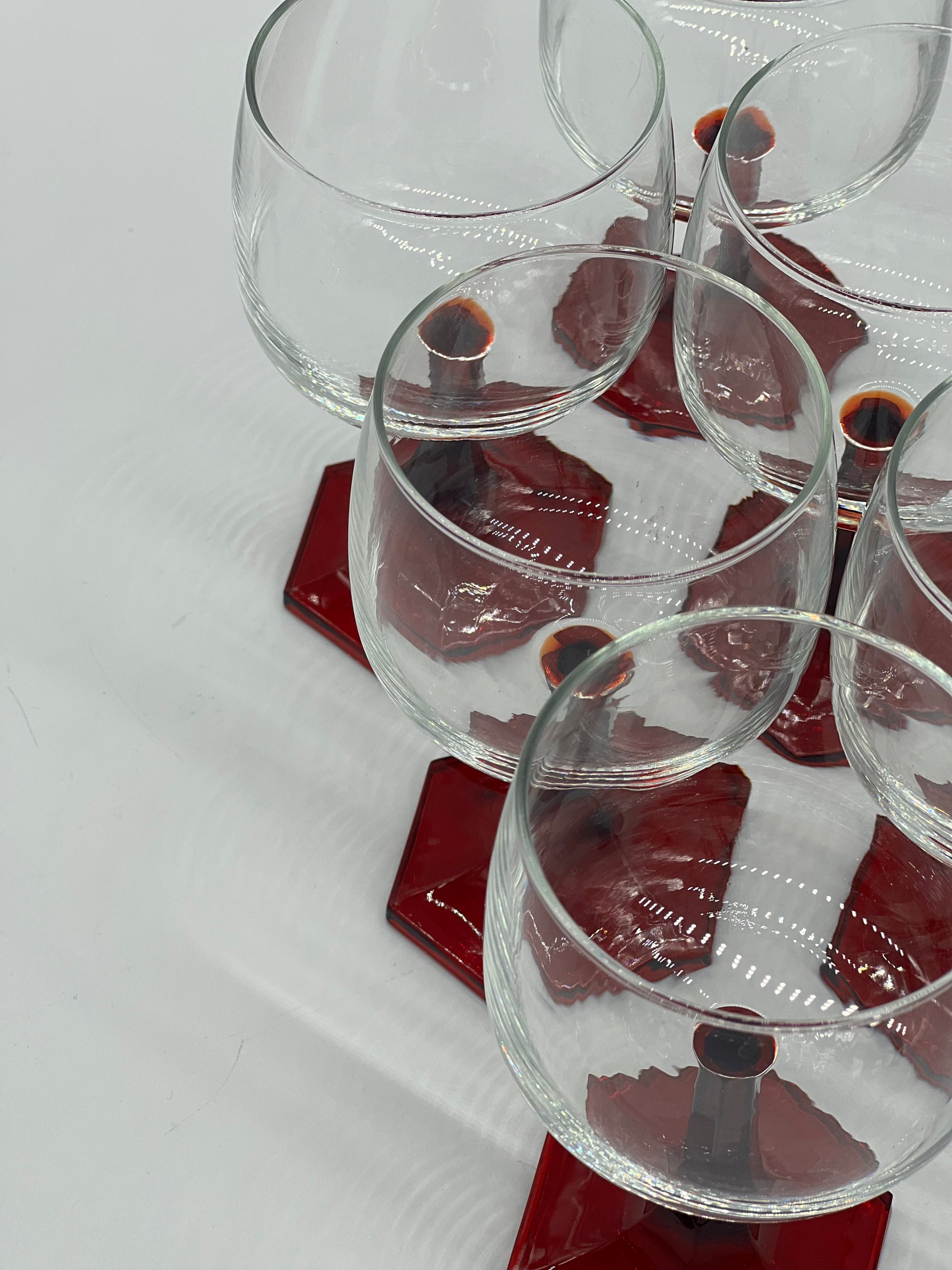 red stemmed wine glasses