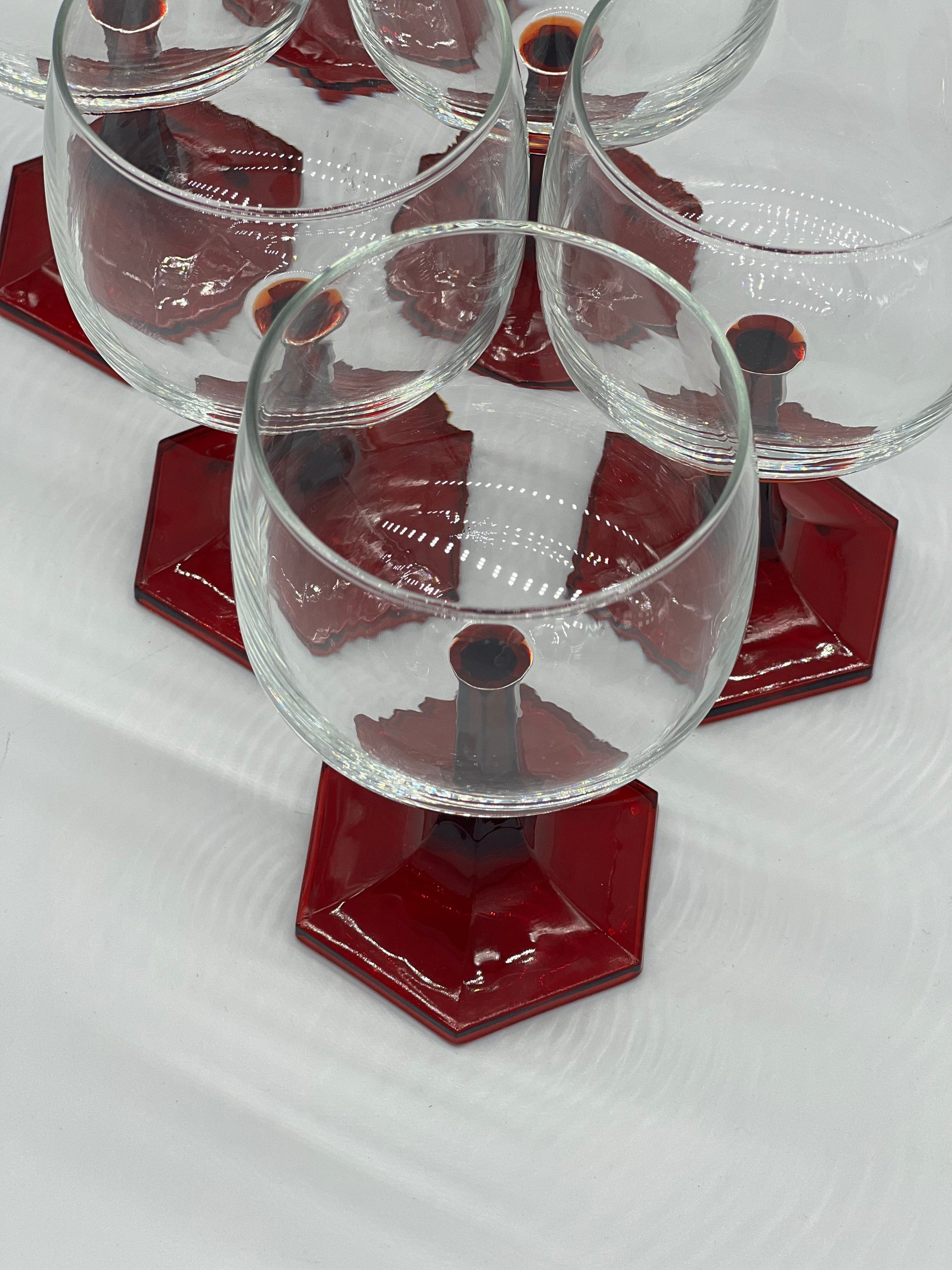 red stemmed wine glasses