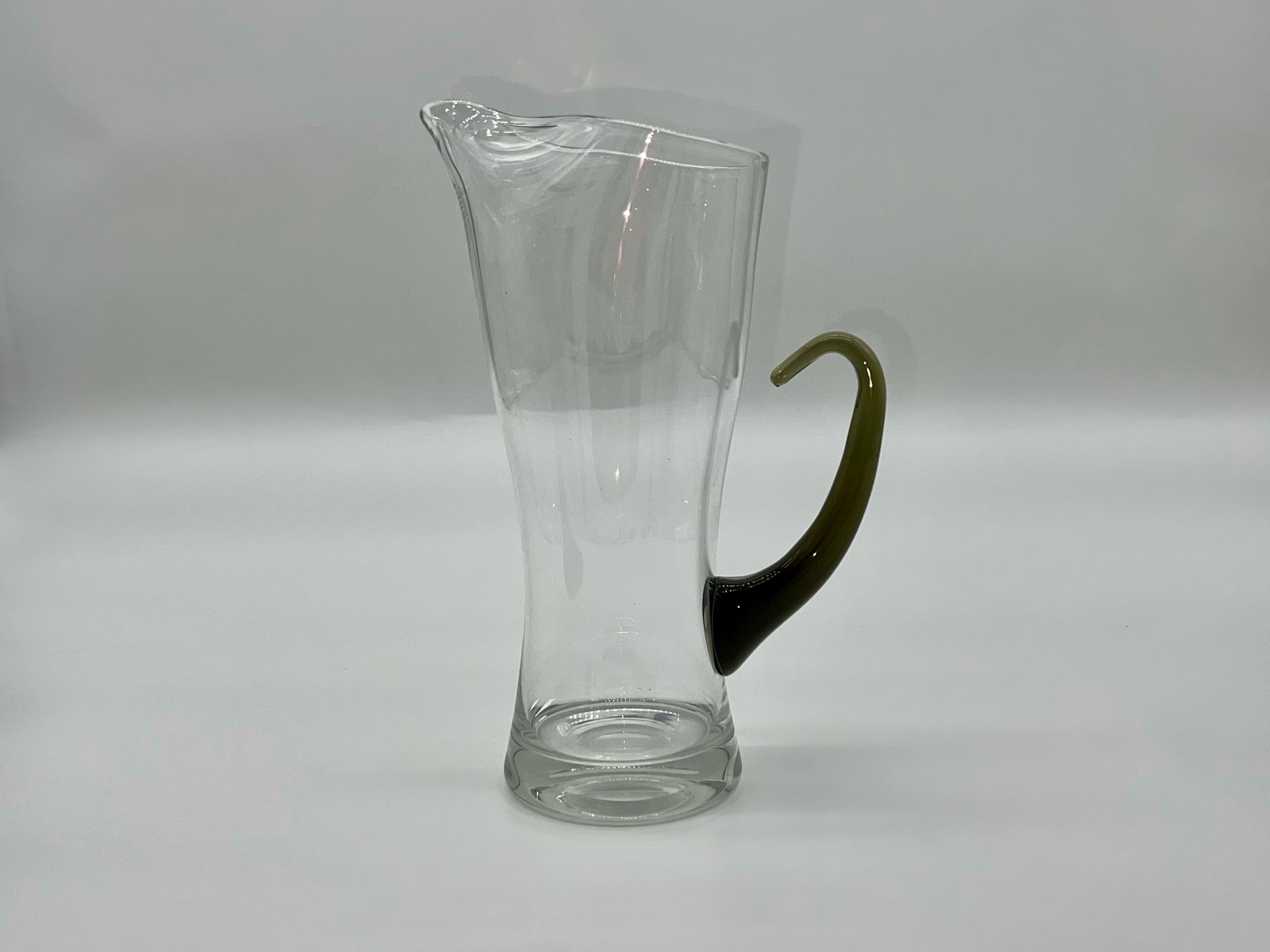 artisanal jug with smoked glass handle