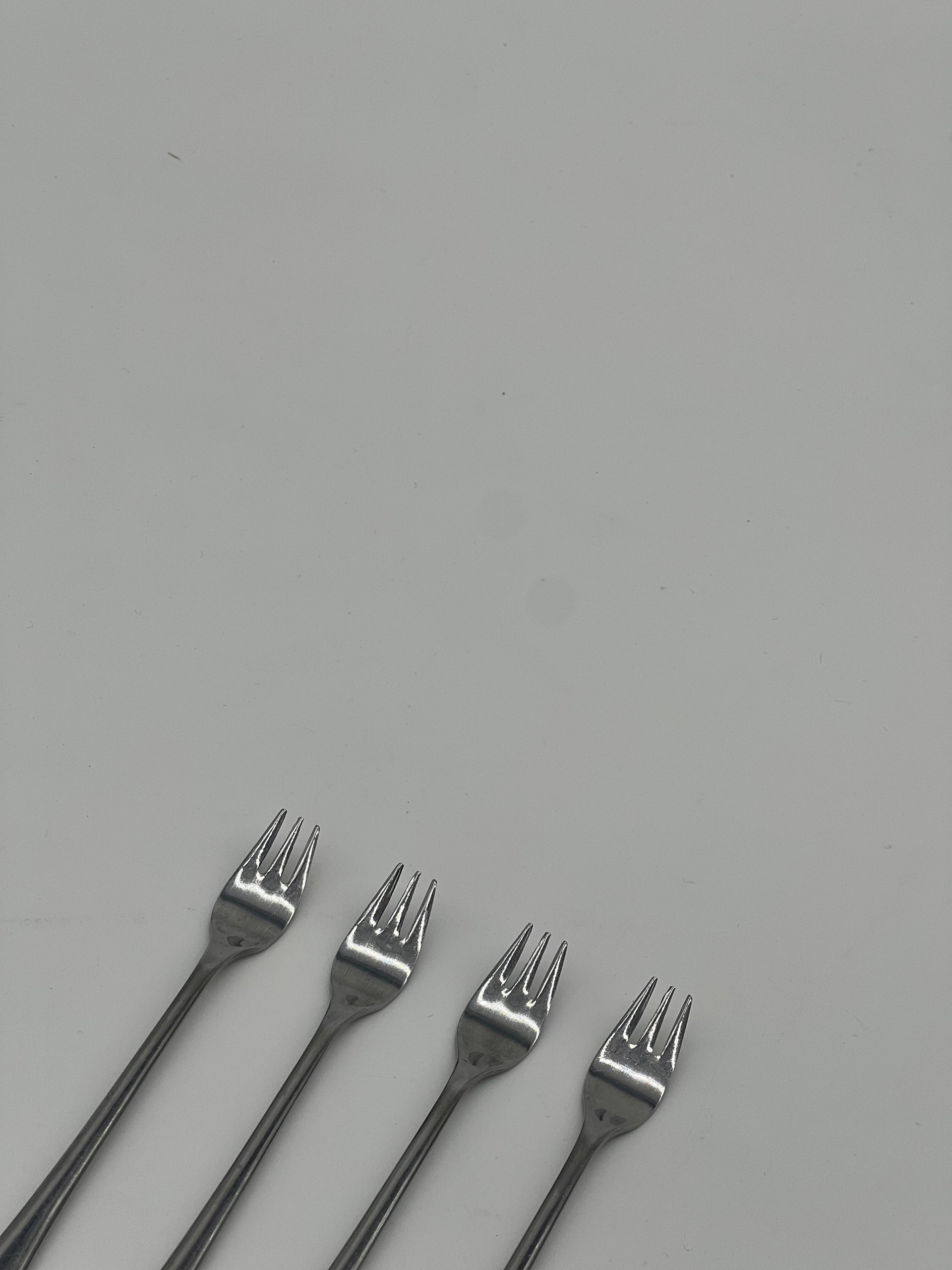 red inlay cocktail forks