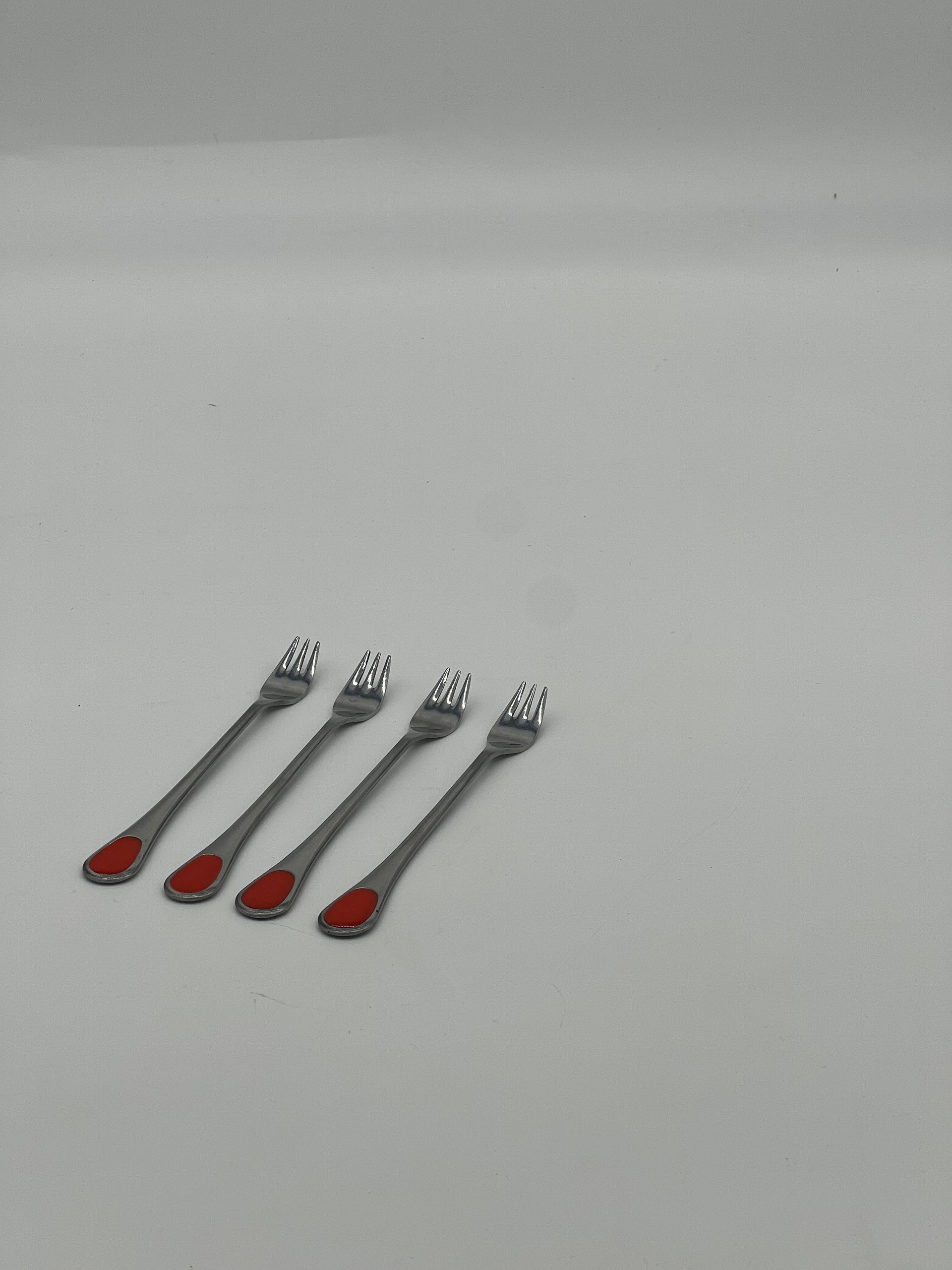 red inlay cocktail forks