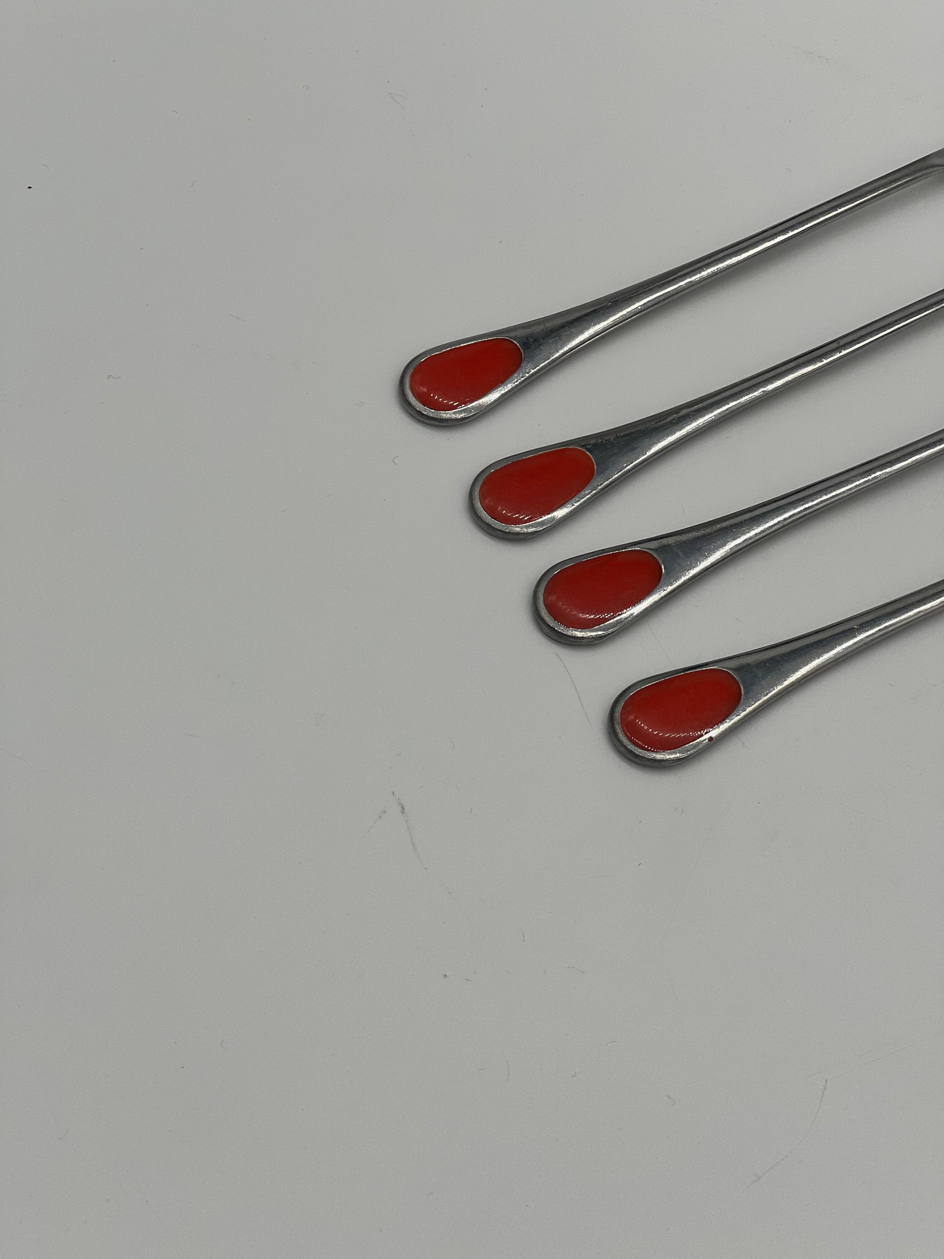 red inlay cocktail forks