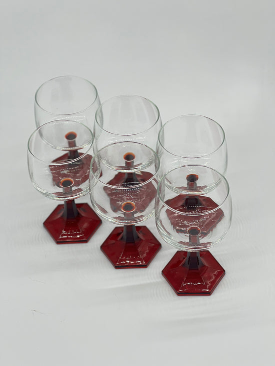 red stemmed wine glasses