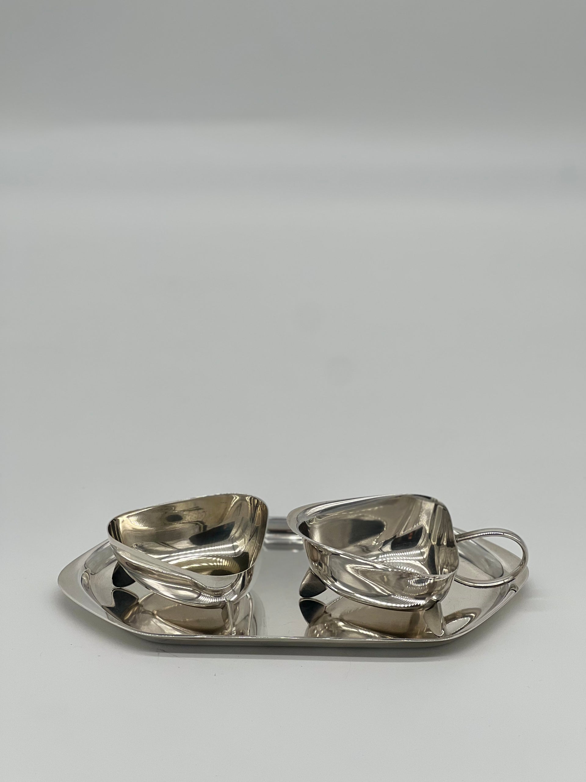 silver plated sugar bowl and creamer